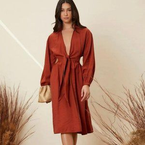 Lantern sleeve dress with front opening and bow